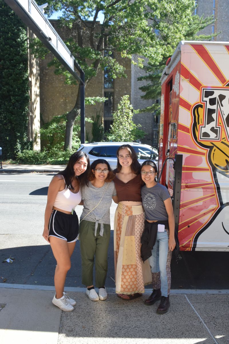 A group of students from the class of 2025 standing next to an ice cream truck