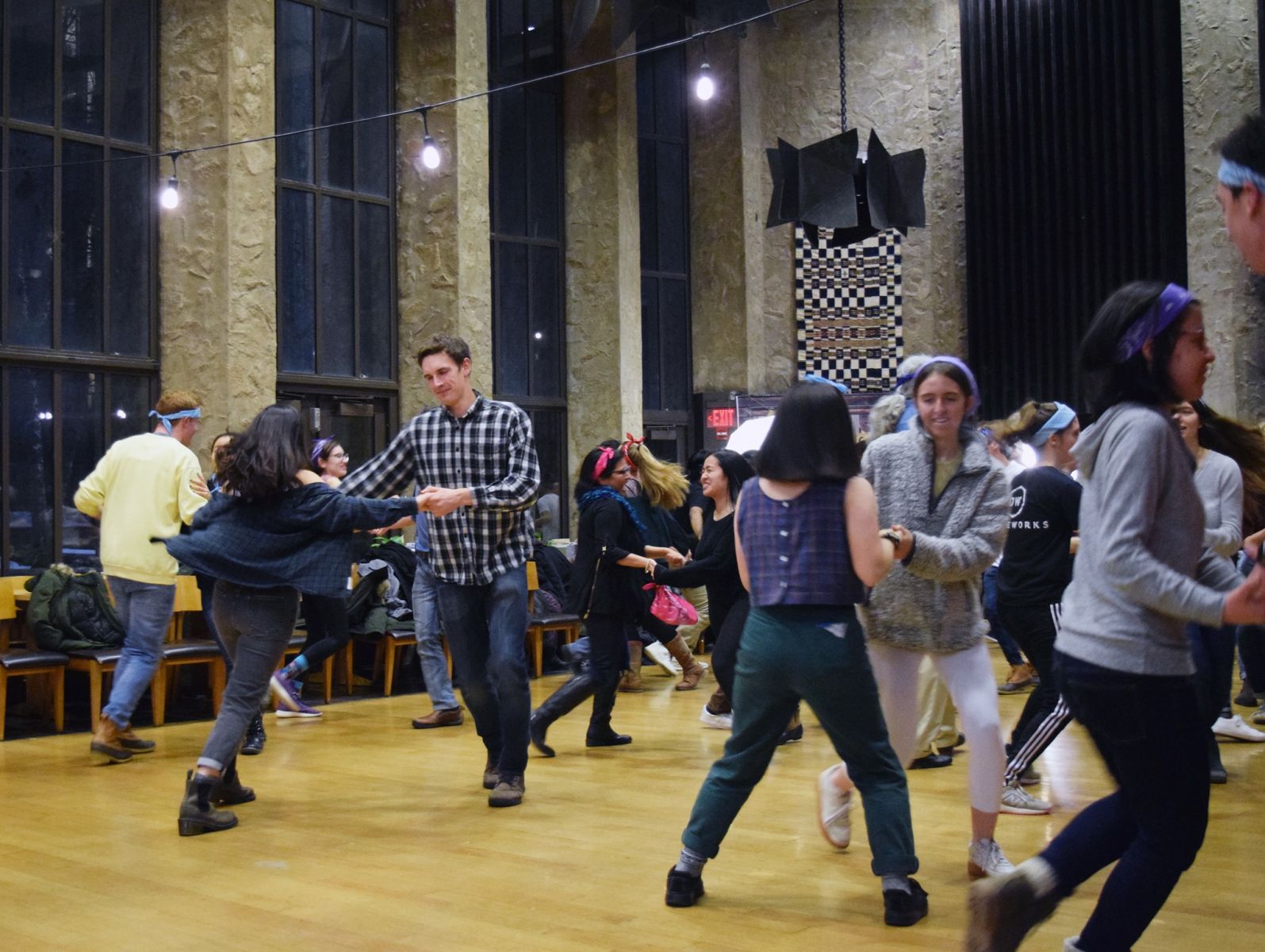 Yale students contra dancing in the dining hall