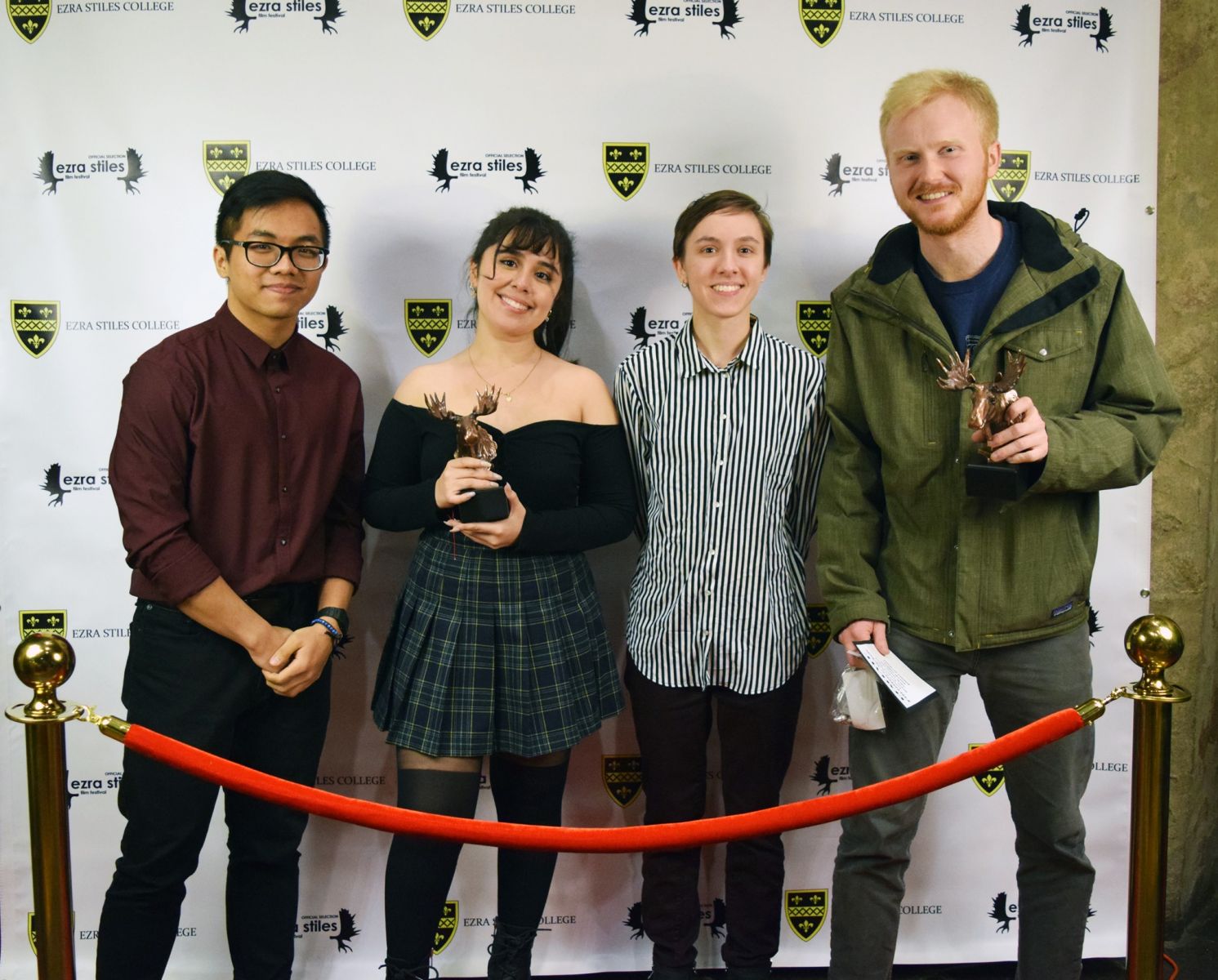 4 Golden Moose winners holding their trophies
