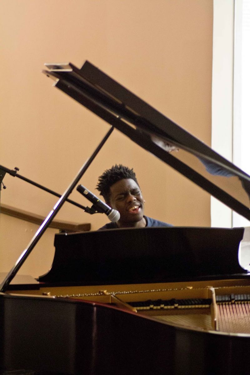 Arts Week guy playing piano