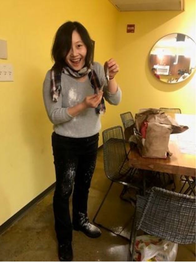 A Yale student working on making dumplings