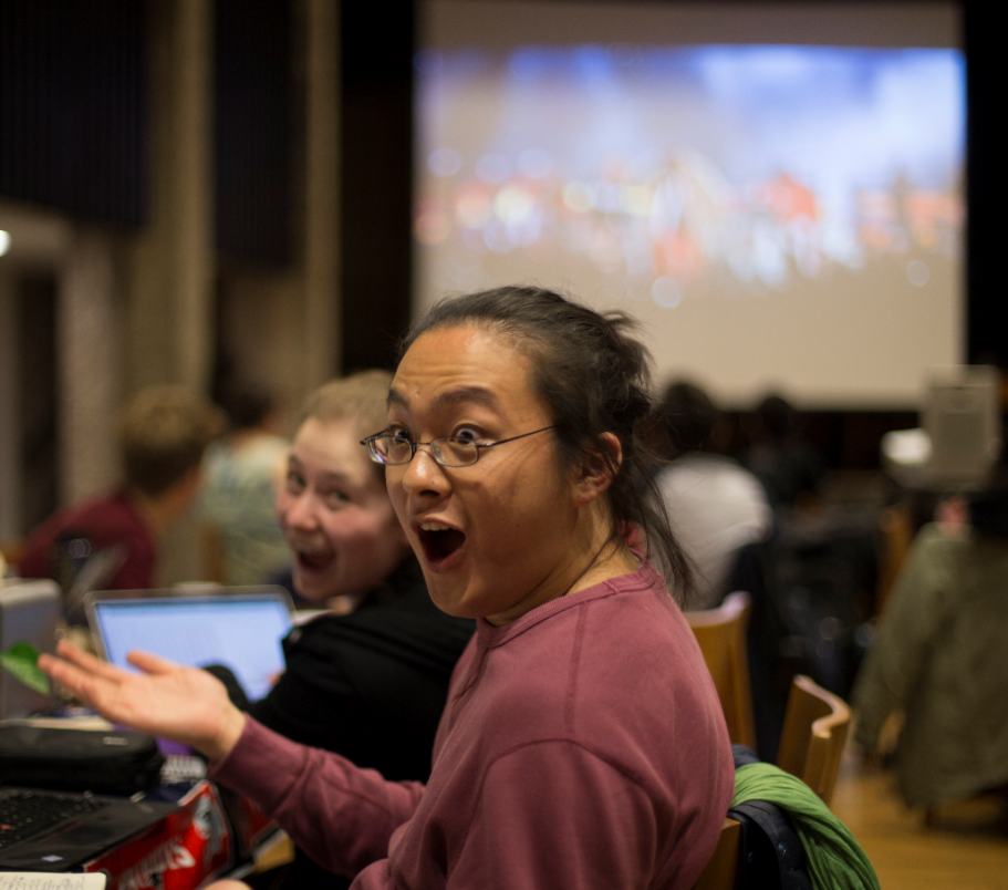 students enjoy watching the 2019 superbowl at the watch party