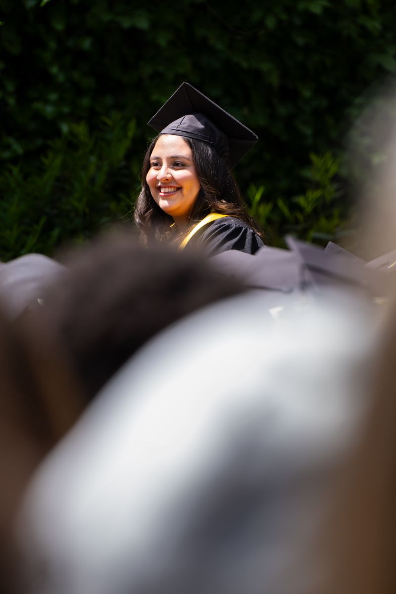 Focusing on the graduating student with black cap