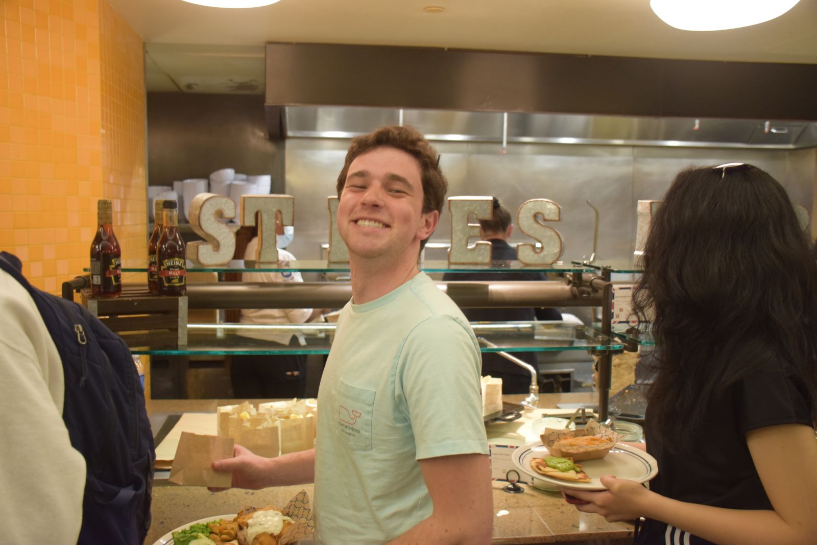 Students getting fish and chips at the dining hall