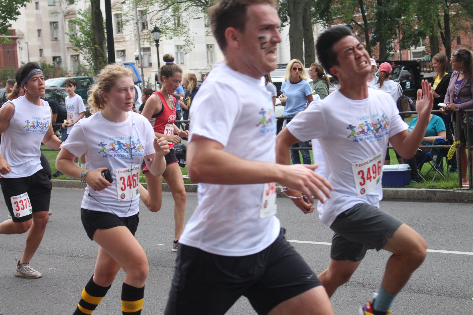 Stilesians running in the road race down the streets of Elm City