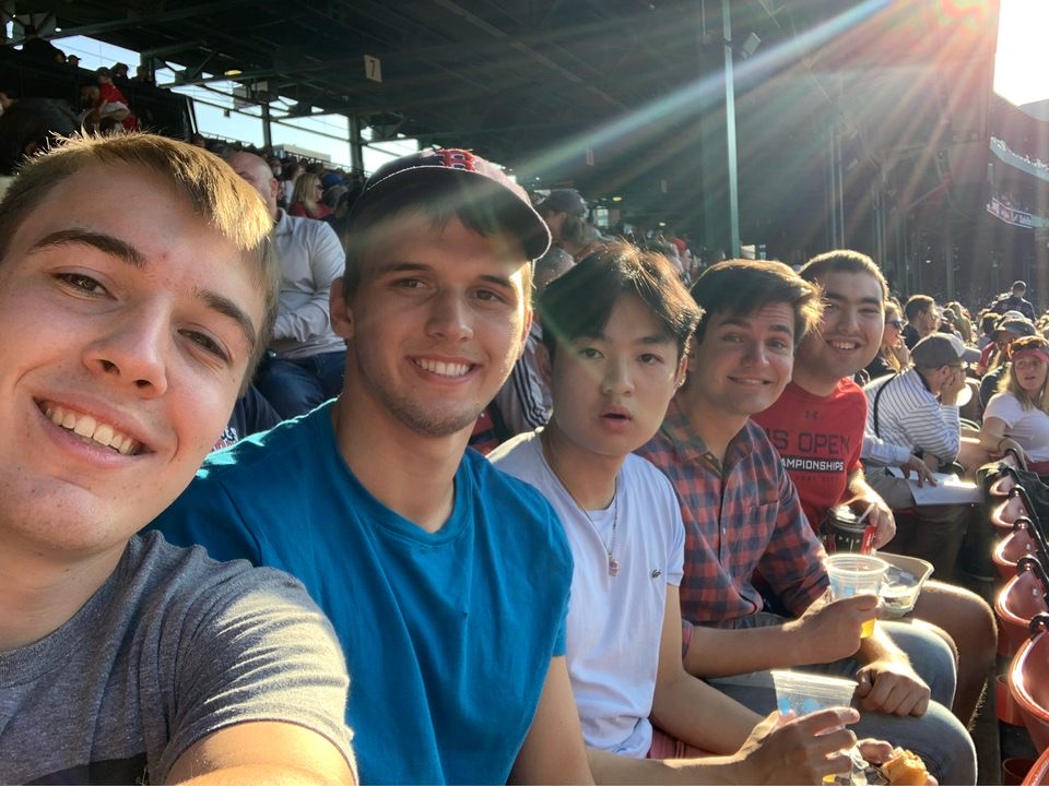 Stilesians taking a group selfie at Fenway Park's seats