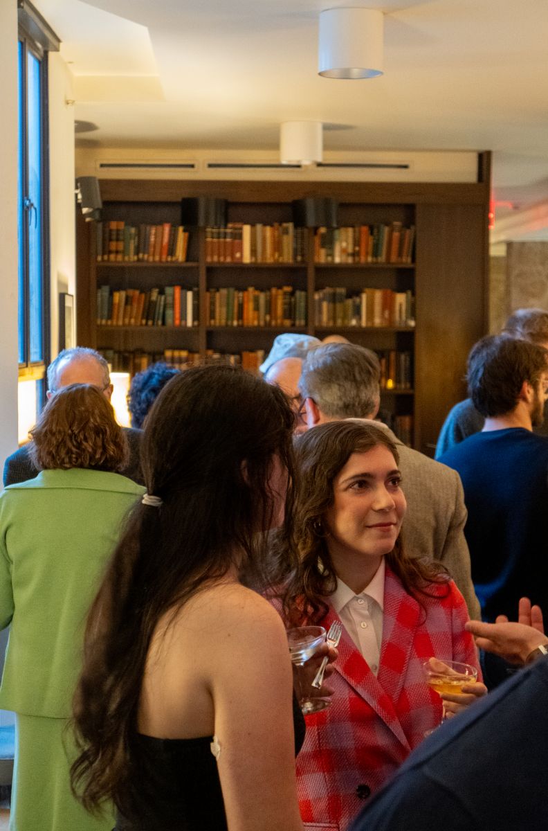 Stiles Seniors and Fellows having conversation at the library