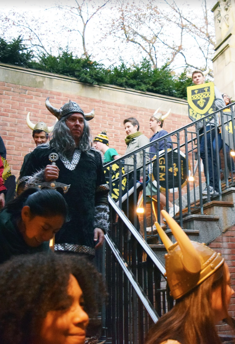 The Moose vikings walk down the stairs to raid another college