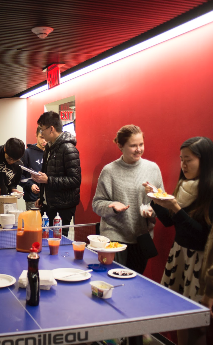 Students enjoying the food at the event
