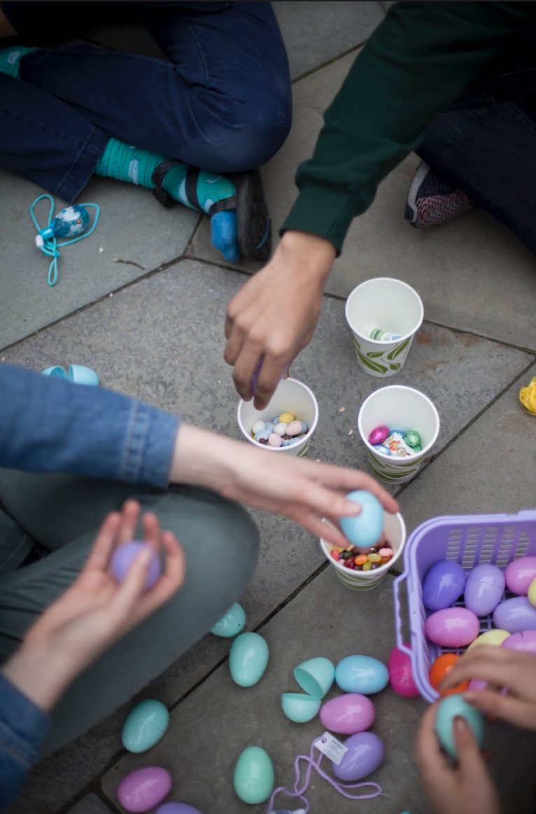 Students open the eggs full of chocolate and jelly beans
