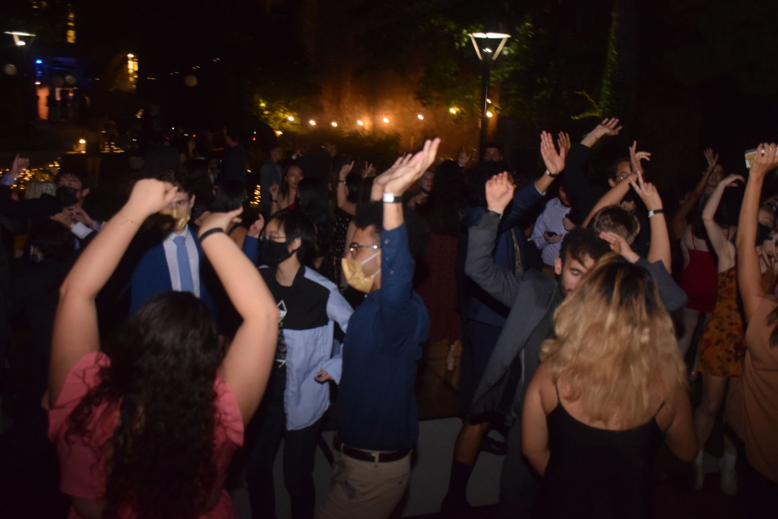 The Ezra Stiles Gala during COVID times, students dancing outside in the evening