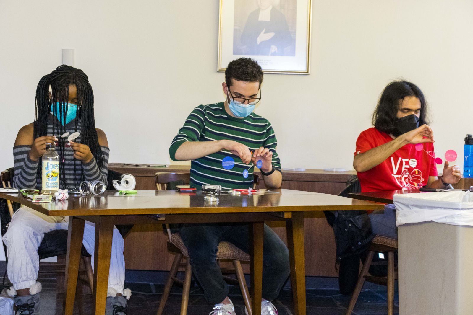 3 yale students doing arts and crafts