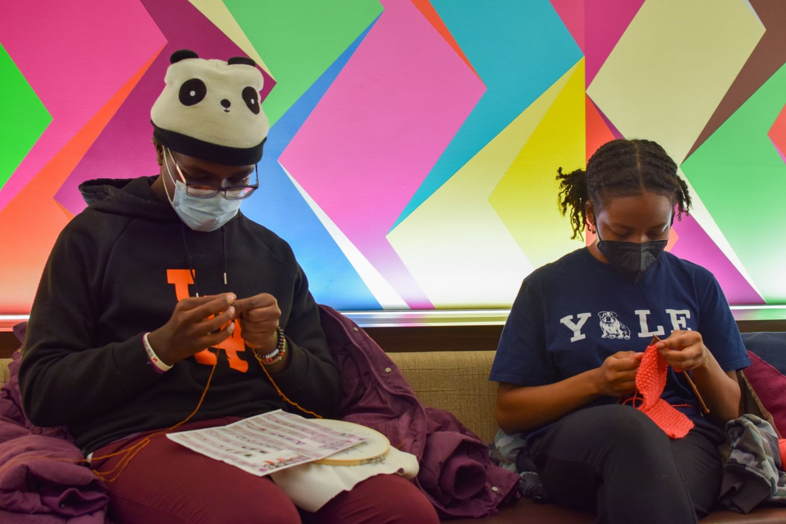 2 yale students knitting at the common room