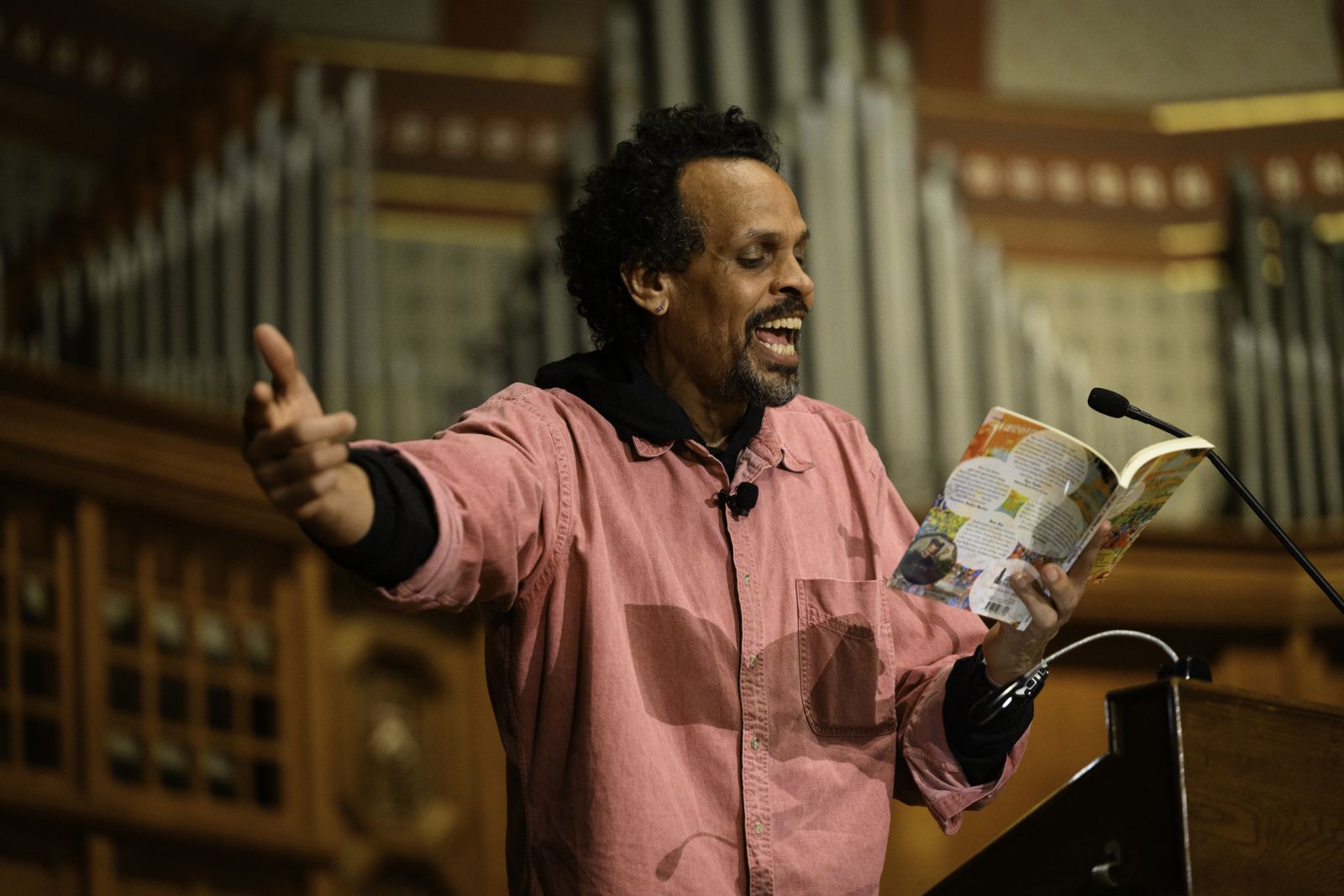 Ross Gay reading a book