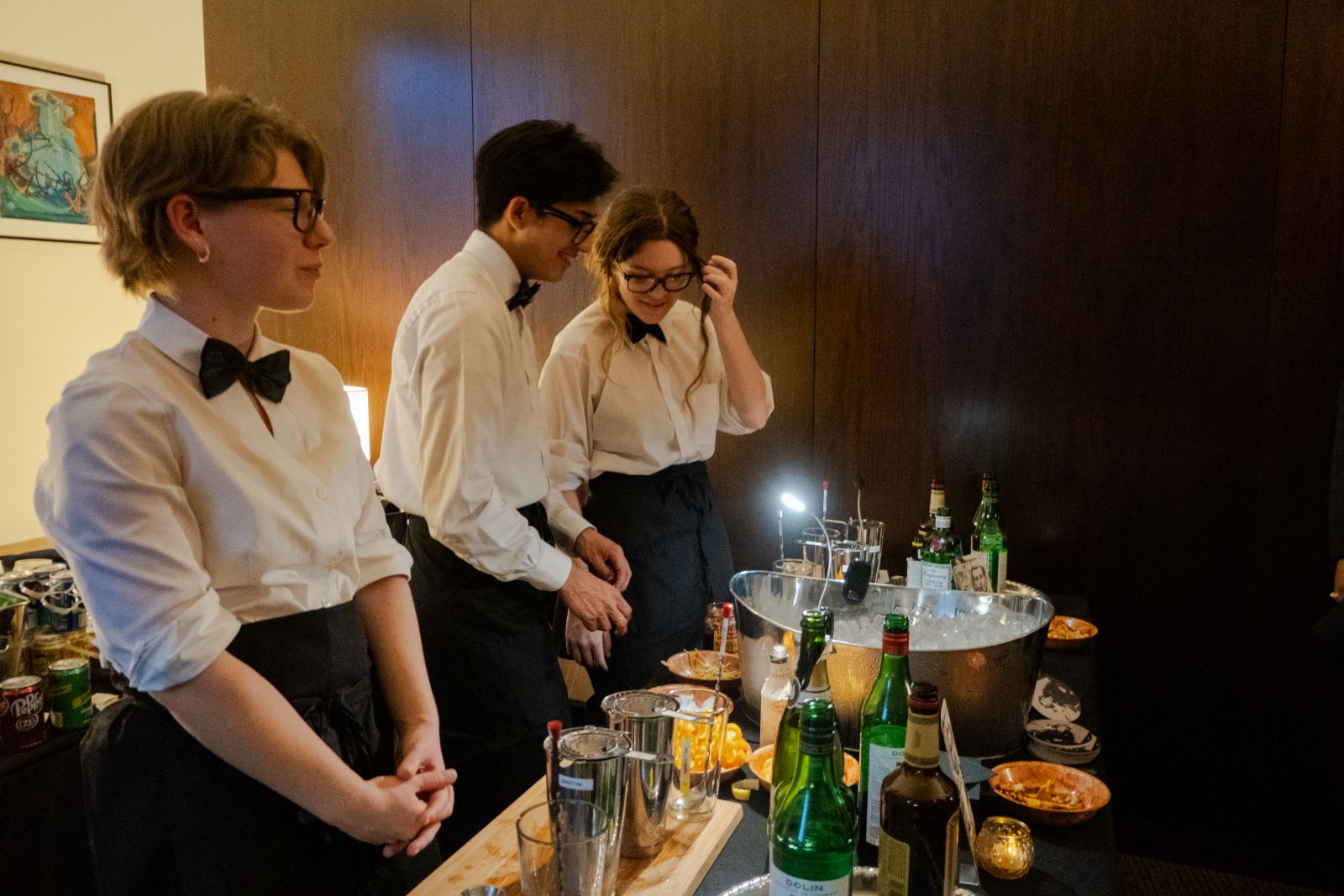 Waiters serving cocktails