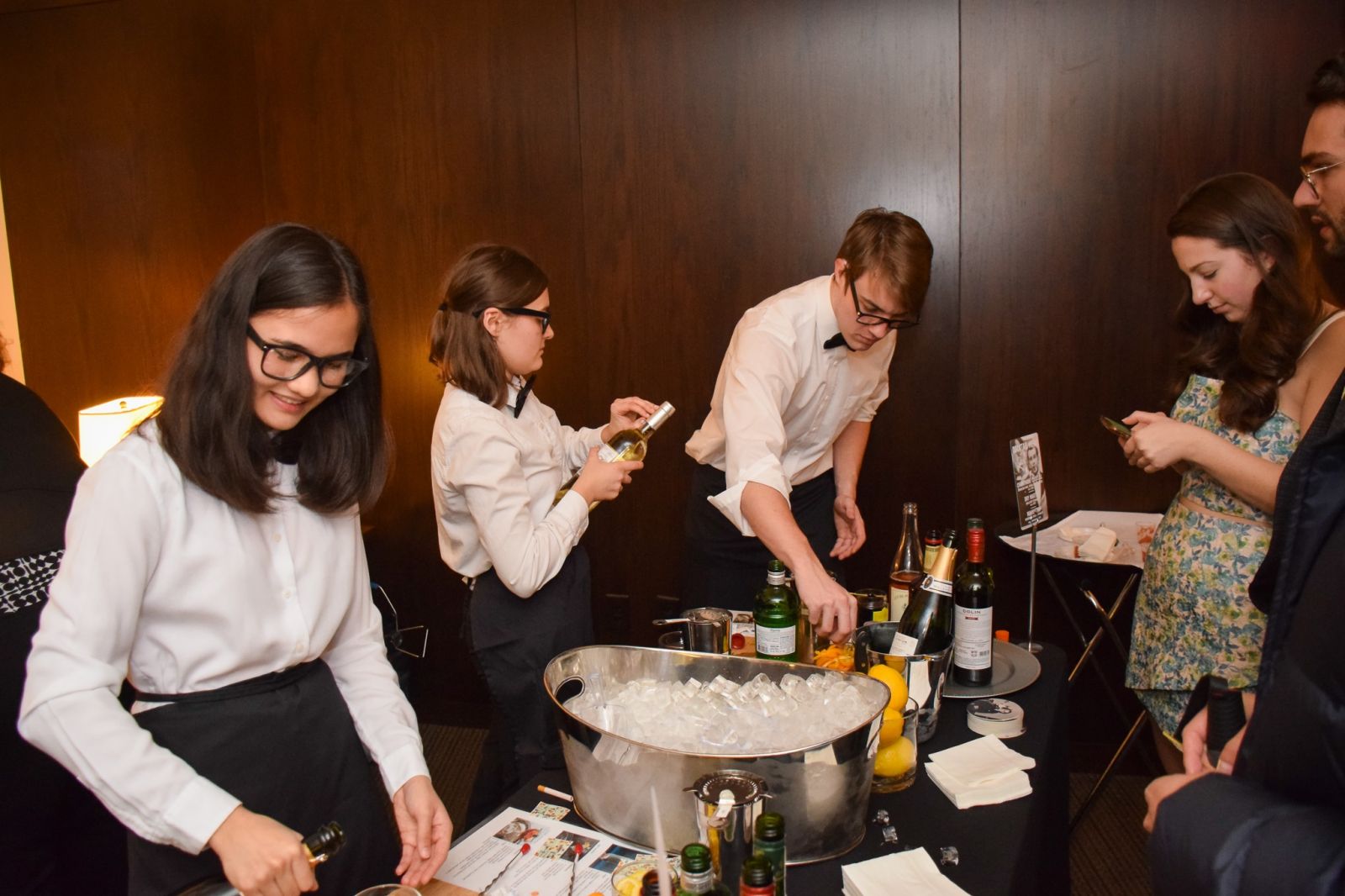 Waiters serving cocktails