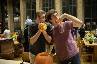 Students eating the pumpkins guts