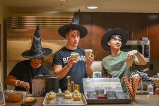 3 boys selling coffee