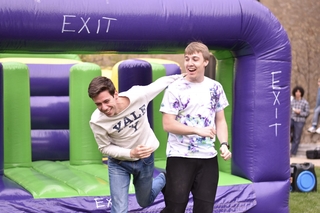 Yale students having fun at the bounce house
