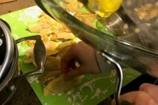 Final touches on a batch of dumplings