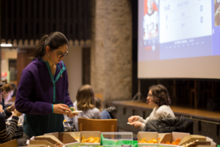 students getting finger food for the 2019 super bowl