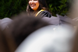Focusing on the graduating student with black cap