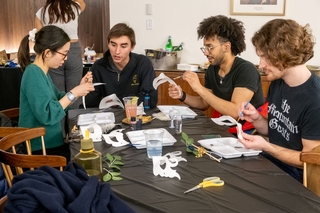 Students making unique masks for the Yale Senior Masquerade