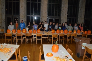 All of the Stilesians at the gala shows off their carved pumpkins