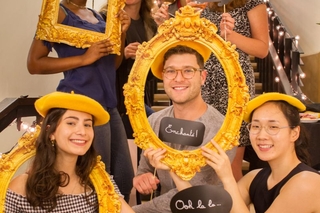 Stiles seniors using prop frames and berets