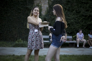 Students having fun and talking to new friends