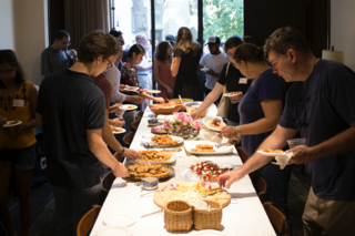 Families and first-year students getting food