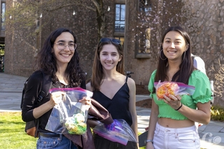 group of Stilesians showing off their tie-dyed shirts in green, purple, and orange