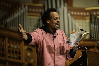 Ross Gay reading a book