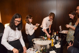 Waiters serving cocktails